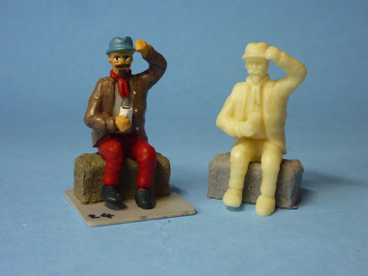 Man seated on Straw Bail with Mug (FIG-2401)